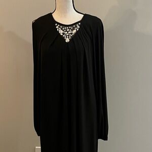 Elegant Black Dress with Embellished Neckline